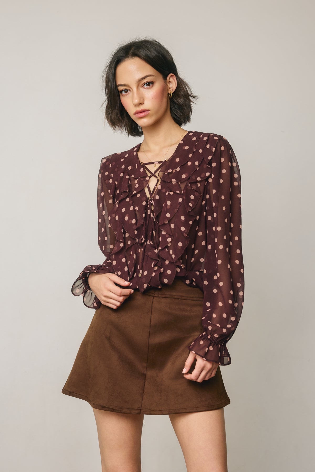 Polka Dot Lace Up Ruffled Blouse